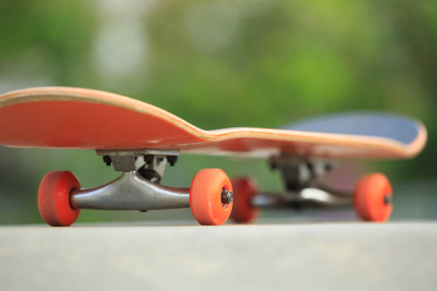 istock skateboard on skatepark ramp ready for next ride 868477380