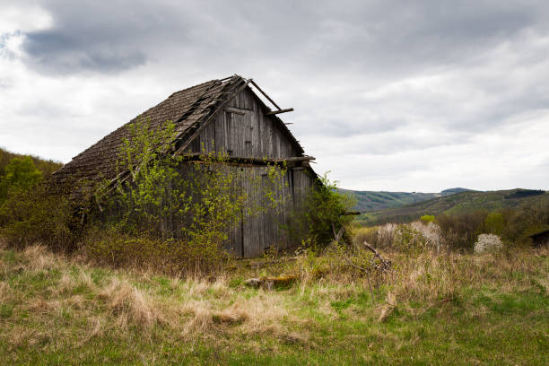 Rural West Slovakia countryside with abandoned barn and farmland