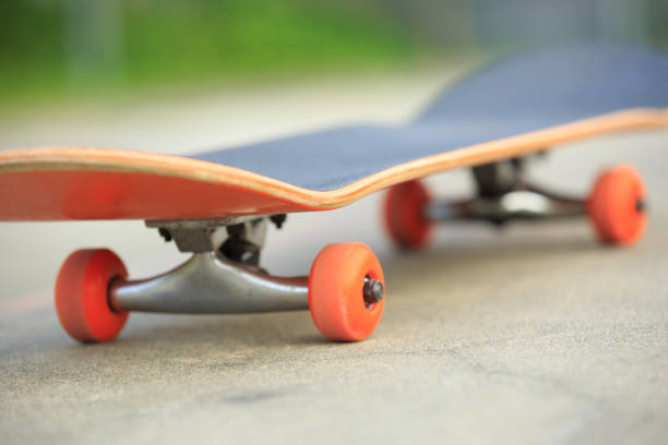 istock skateboard on skatepark ramp ready for next ride 868481216