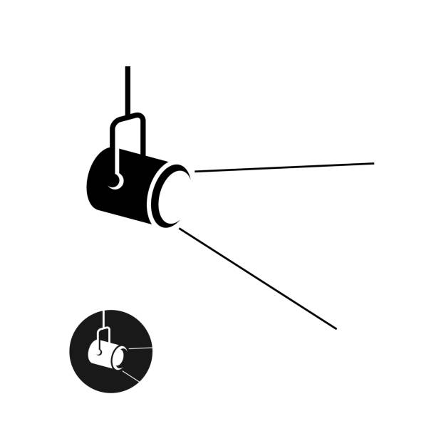 schwarze silhouette symbol "spotlight" mit licht zerstreut strahlen - suchscheinwerfer stock-grafiken, -clipart, -cartoons und -symbole