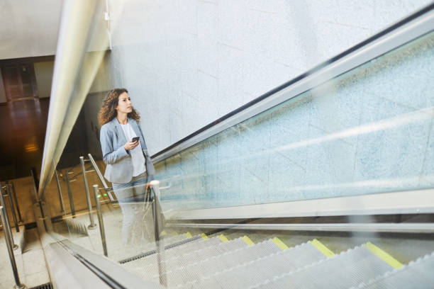 istock Single business woman commuting, on the move. 868486928