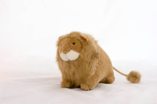 istock stuffed animal lion on a white background . 868494706