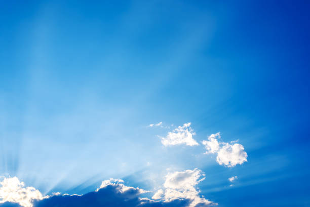 istock Sunbeam through the haze on blue sky 868498552