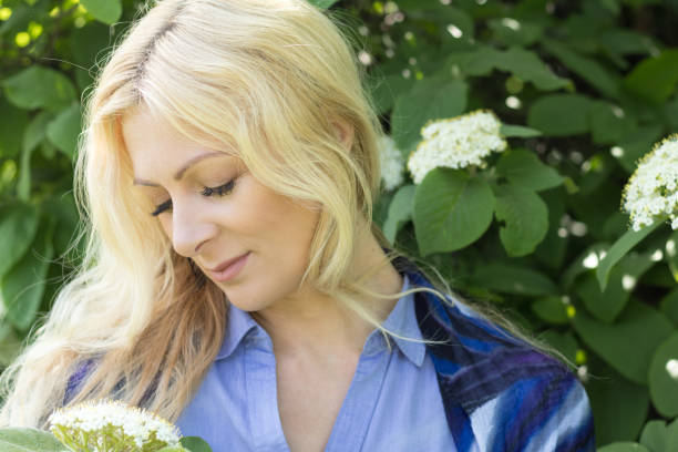 istock Pretty blond in the city park in spring 868498756