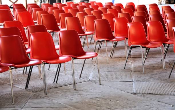 istock Red armchairs in a row for musical performance. 868502648