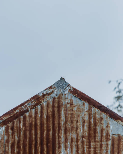 istock Edge of Rusted Metal Roof 868502788