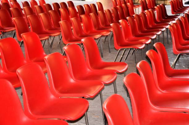 istock Red armchairs in a row for musical performance. 868503236