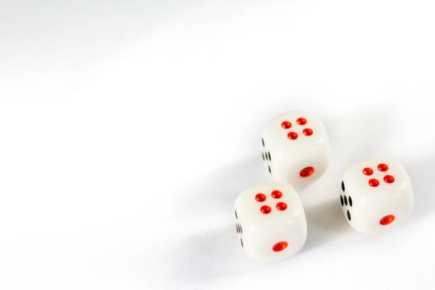 istock Three dices have triple four point isolated on white background 868504078