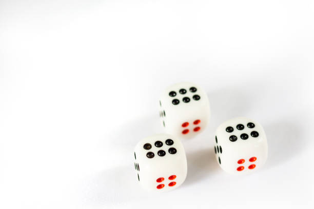 istock Three dices have triple six point isolated on white background 868504474