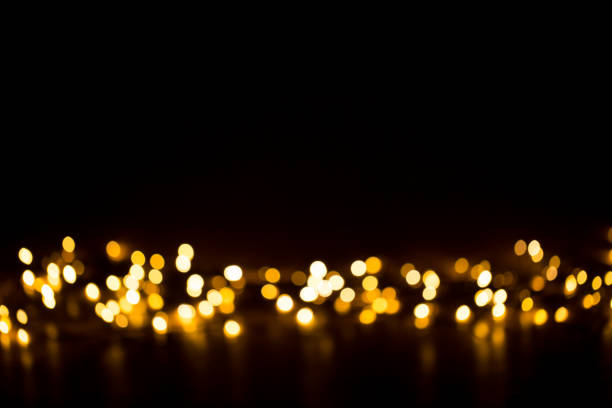 istock Christmas background with light spots and bokeh. 868511536