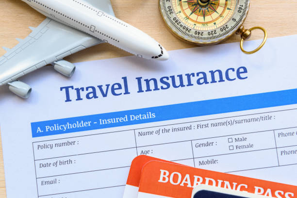 Travel insurance form put on a wood table. Travel insurance form put on a wood table. Many agent sells airplane tickets or travel packages allow consumers to purchase travel insurance also known as travelers insurance as an added service. airplane crash photos stock pictures, royalty-free photos & images