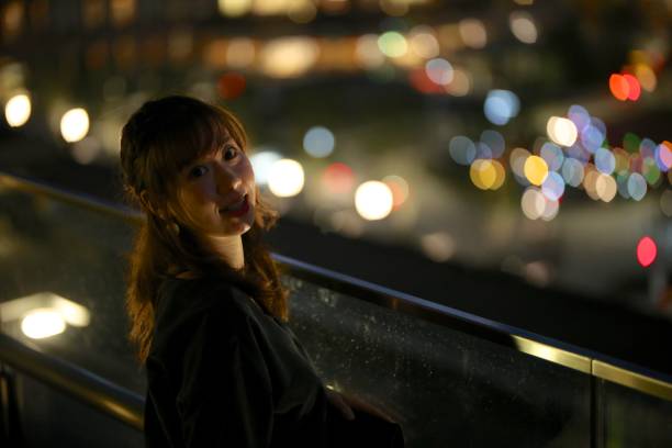 istock Young woman at terrace 868519248