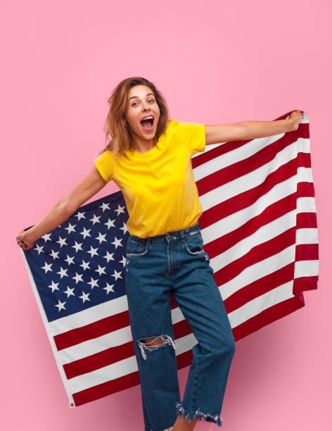 istock Excited woman with USA flag 868520088