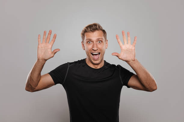 istock Playful man in sportswear posing in studi 868522714