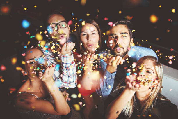 istock Group of people having a party on the roof 868530034