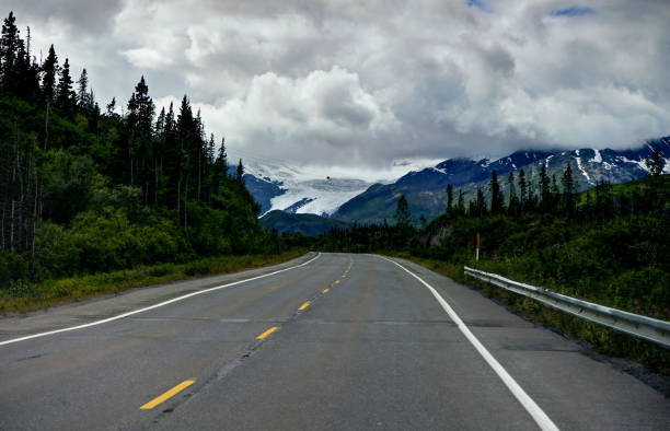 istock Empty street with view towards Glacier mountain panoarama in Ala 868531990