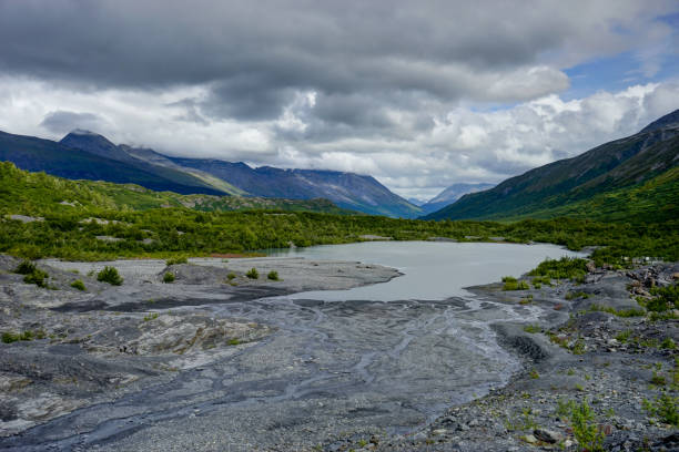 View towards mountains overlooking riverbed from Worthington Gla Photo taken in Alaska, United States of America. Worthington stock pictures, royalty-free photos & images