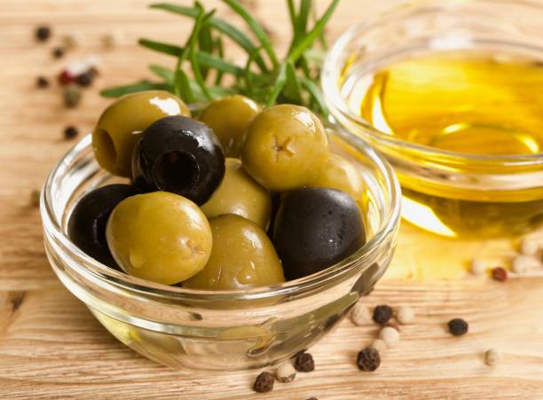 istock green and black olives 868535796