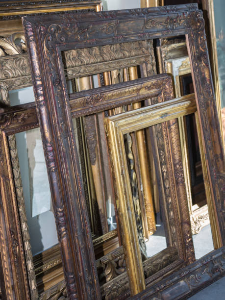istock Stack of Golden Wooden Vintage Frames, Indoors 868544488