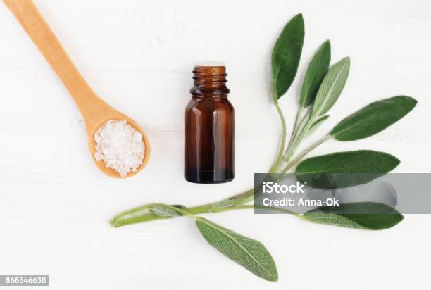 Salvia Officinalis Essential Oil And Sea Salt For Natural Skincare Stock Photo - Download Image Now