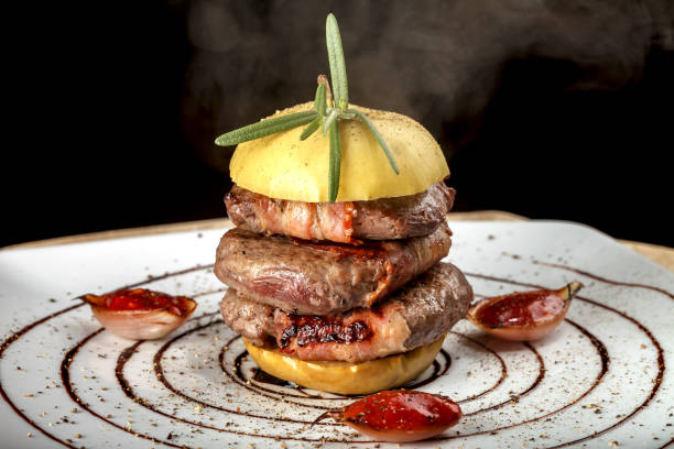 istock A beautiful presentation of fried meat with an apple. 868548366