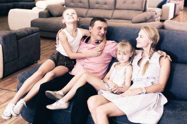 istock Family is satisfied by new bought sofa 868551324