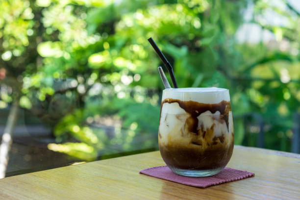 istock Iced Mocha Coffee With Chocolate Syrup, bokeh background 868555692