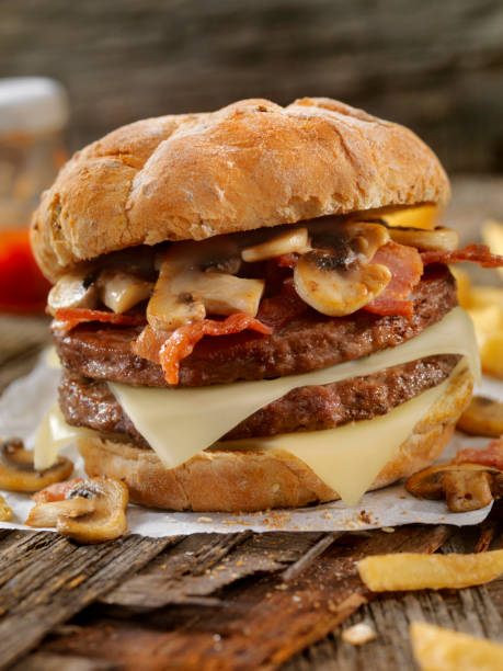 istock Mushroom, Bacon, Swiss Burger with Fries 868555940