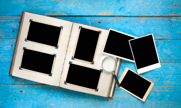 istock photo album with empty photo frames 868560340