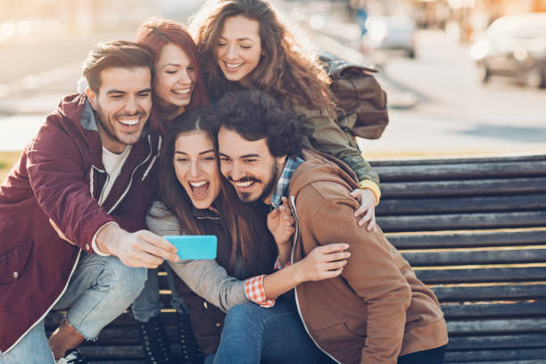 istock Friends with smart phone 868564546