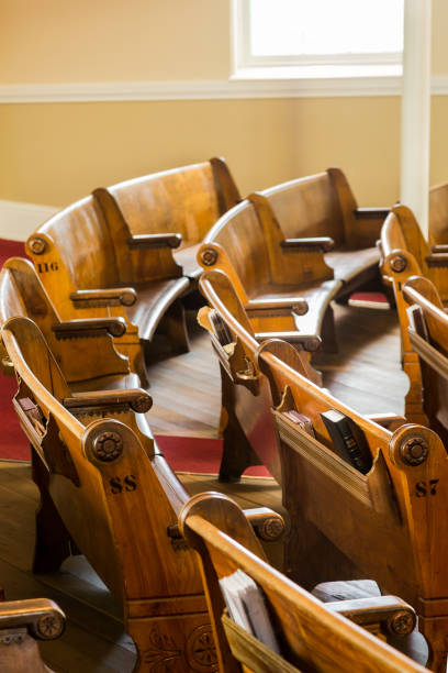 istock Curved Pews in Church 868565732