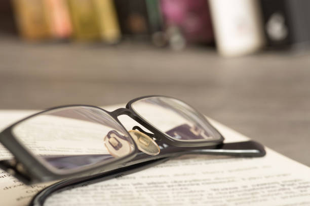 An Open Book and the Glasses stock photo