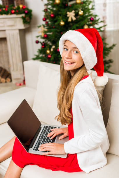 istock teen girl using laptop 868568256