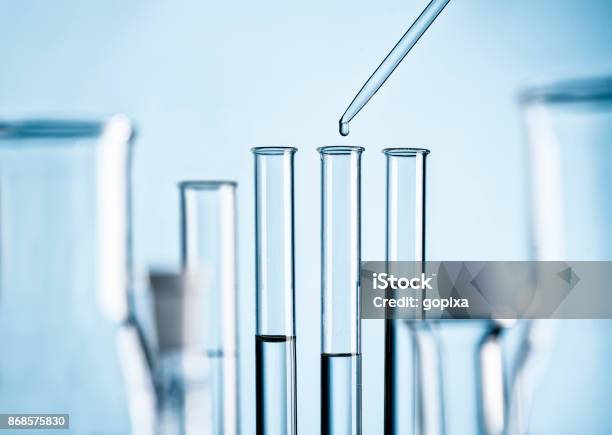 Laboratory With Test Tubes Pipette And Glass Flask Stock Photo - Download Image Now