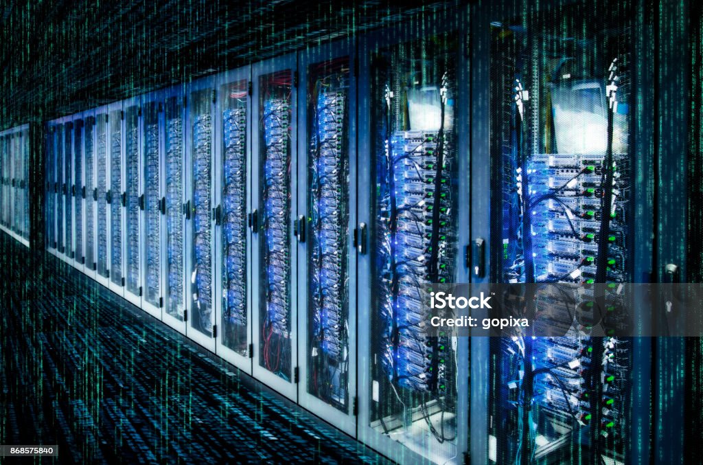 Server racks in a data center Network cabinets with server racks in a matrix data center. Computer Lab Stock Photo