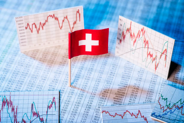 Development of the Swiss economy Swiss flag with price tables and graphs on economic development. europa mythological character photos stock pictures, royalty-free photos & images