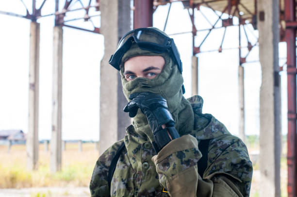 istock Special swat weapon soldier counter-strike on crashed city 868580952