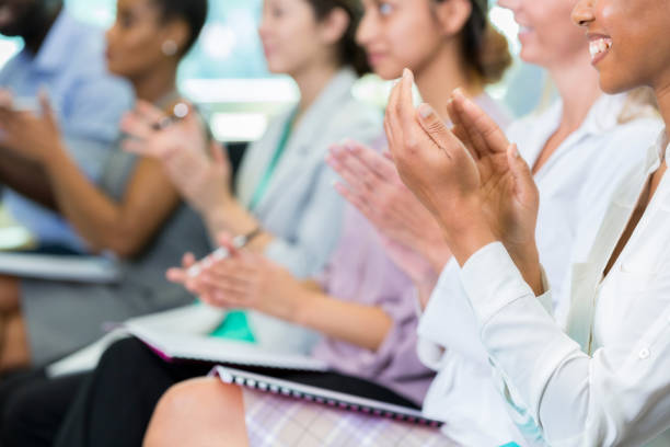 istock Unrecognizable businesspeople applaud during seminar 868584310