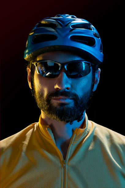 istock The bicyclist on black, studio shot 868587598