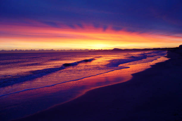 istock sunrise on the beach 868591518