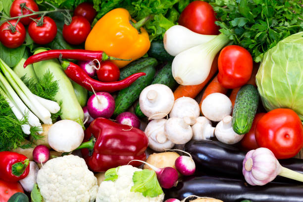 istock Fresh vegetables background close-up of tomatoes, 868591610