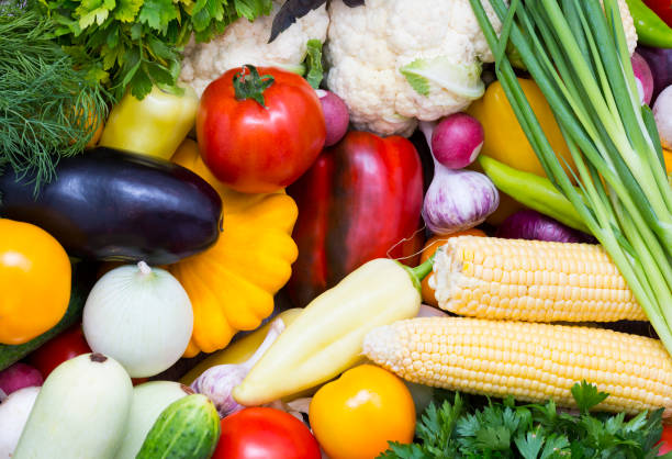 istock Fresh vegetables background close-up of tomatoes, 868591614