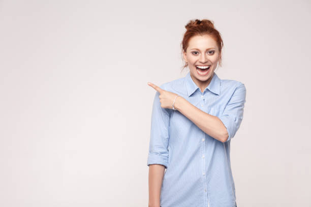 istock Businesswoman pointing copy space. 868595832