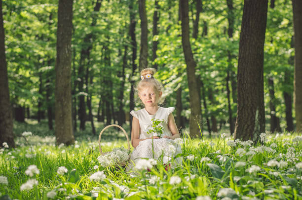 istock beautiful girl in the forest 868603722