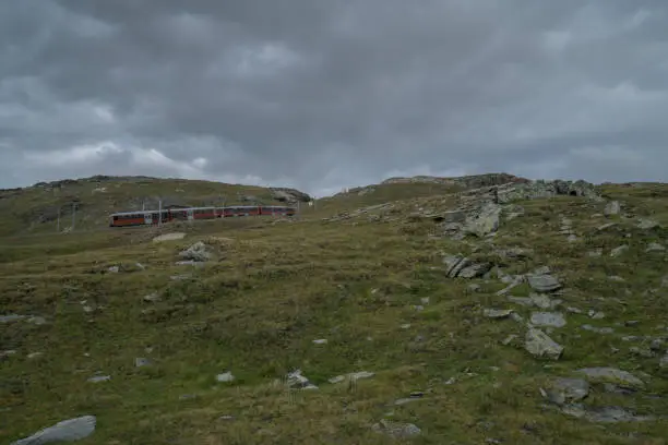 The swiss Bahn train runs on its route, Gornergrat, Canton of Valais, Swiss Alps, Switzerland, Europe