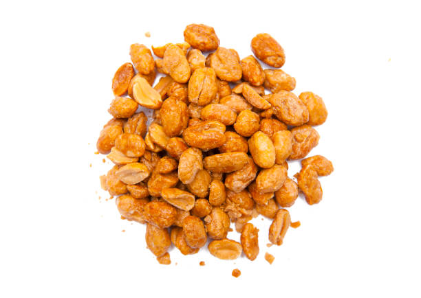 peanuts with caramel isolated on the white background - beer nuts imagens e fotografias de stock