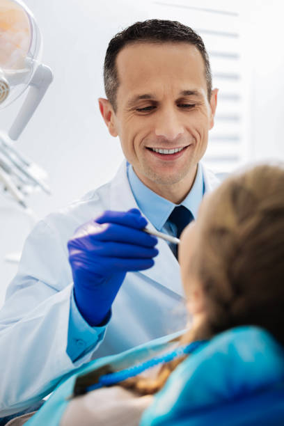 istock Portrait of a nice handsome dentist 868611024