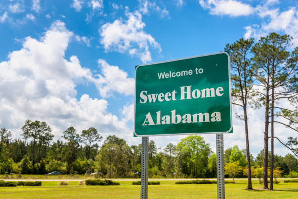 Welcome to Sweet Home Alabama Road Sign in Alabama USA Welcome to Sweet Home Alabama Road Sign along Interstate 10 in Robertsdale, Alabama USA, near the State Border with Florida. alabama us state stock pictures, royalty-free photos & images