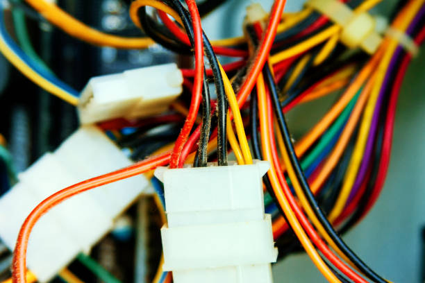 istock Close-up macro of a computer's power cables 868614714