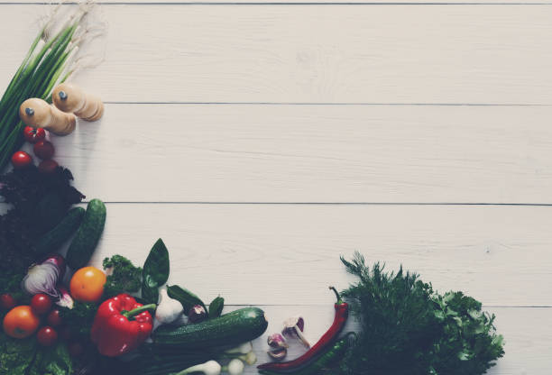istock Fresh vegetables border on white wood background with copy space 868617966